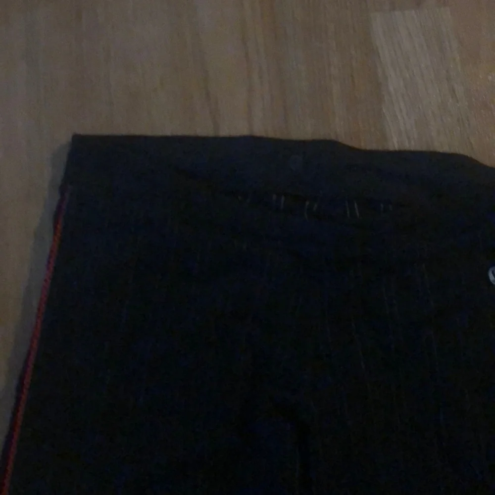 Black and white Lululemon pants.​